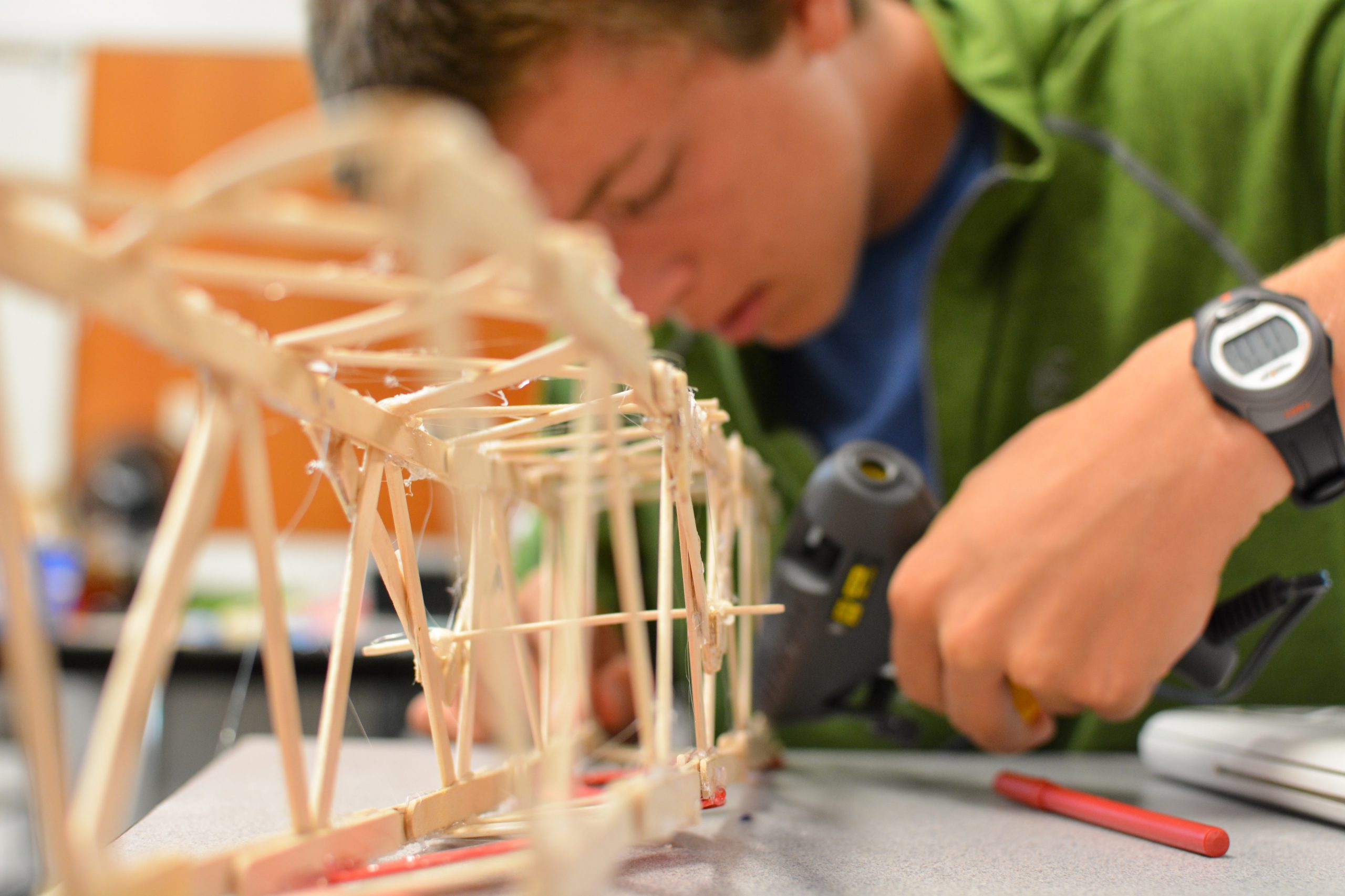 Student building a bridge at Geering Up